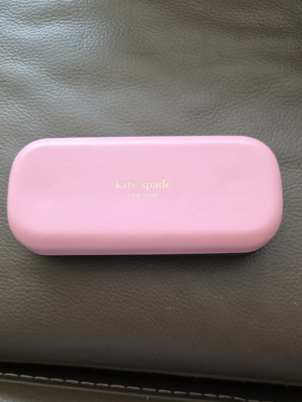 Kate Spade New York hard-shell eyeglasses case  Pink And green.